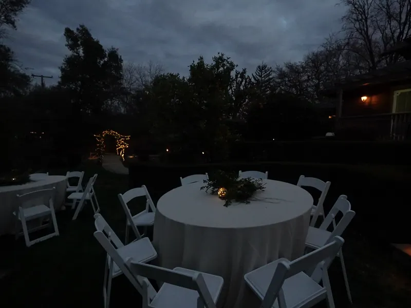 Round table set at twilight for a faculty dinner near Stanford