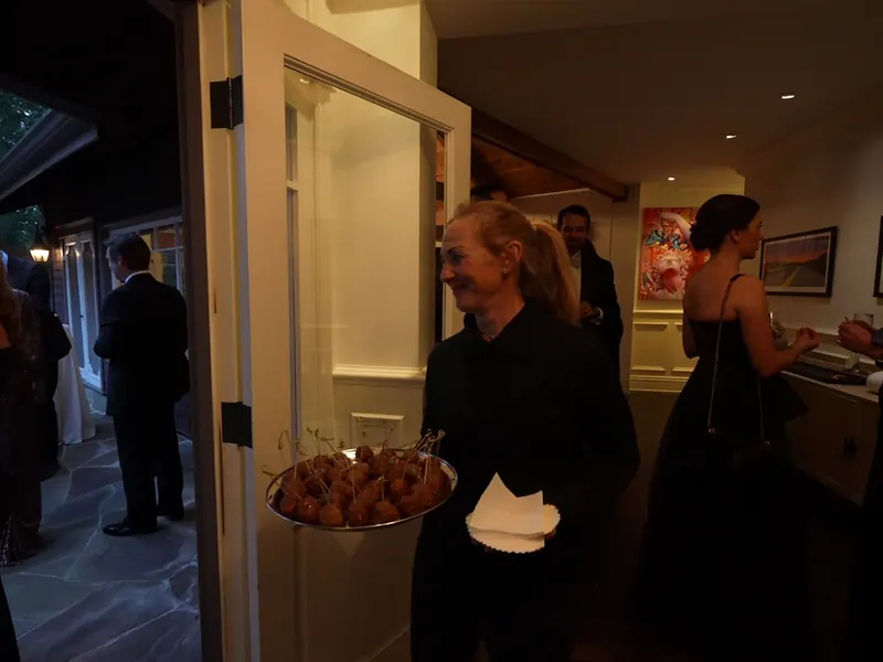 Passed appetizers offered to guests arriving at a Menlo Park event