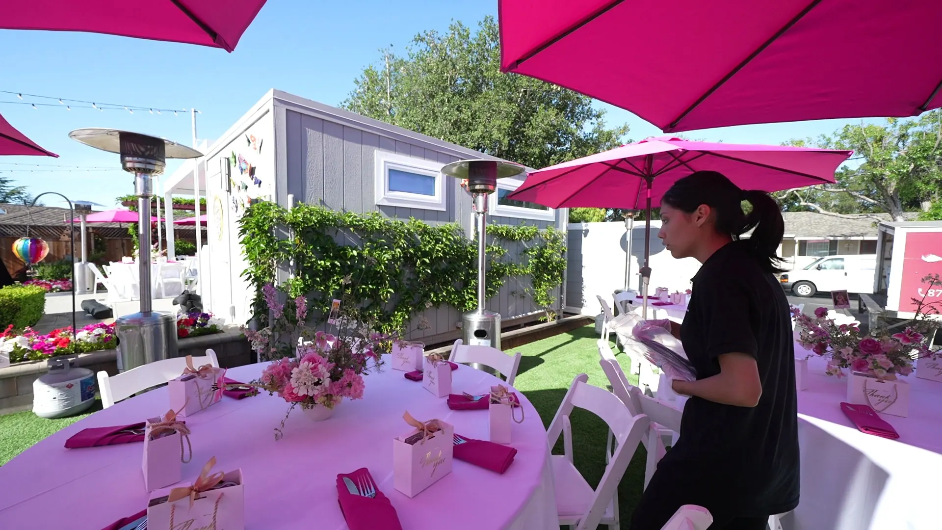 Patio tables with florals arranged for a Woodside garden party