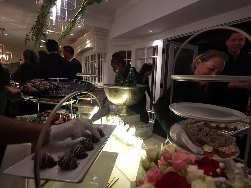 Server passing desserts to guests at a Los Altos celebration