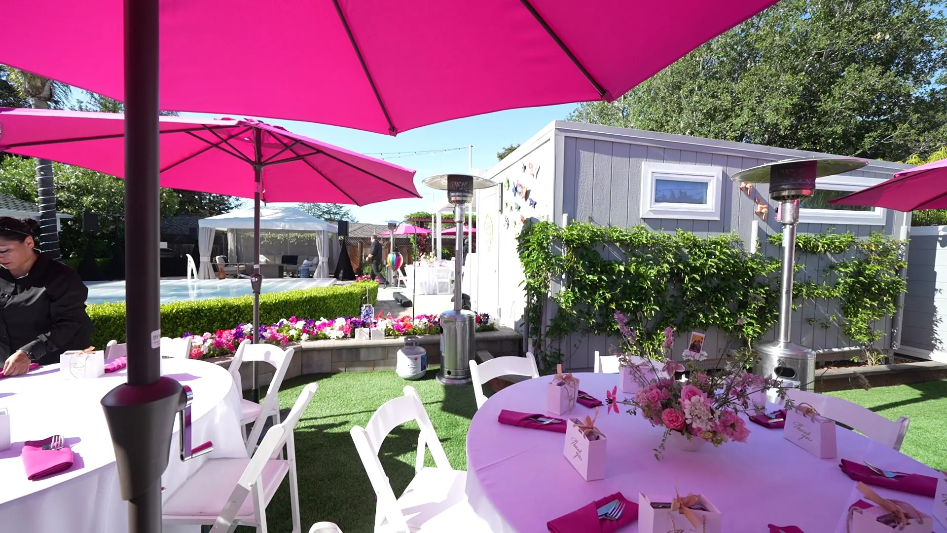 Umbrella-shaded patio tables set for a catered Sunnyvale lunch